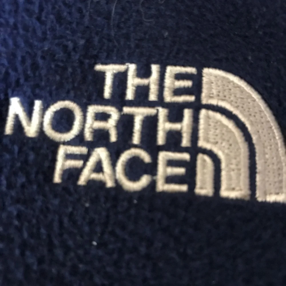 The North Face Men’s Blue and Black Fleece Jacket